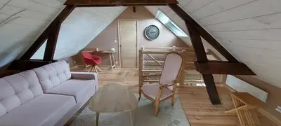 Salon du gîte de groupe Mirage à Bacilly